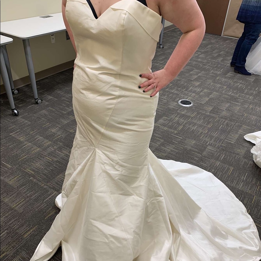 Size 20 wedding dress the bride is a size 16 for reference